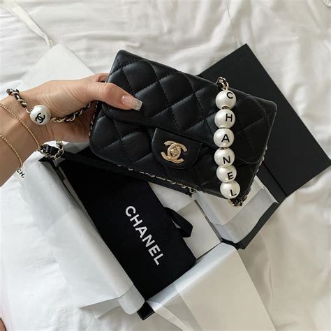 chanel pearl tote bag|chanel bag with pearl chain.